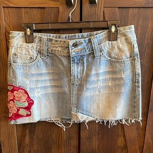 Denim embellished distressed mini skirt